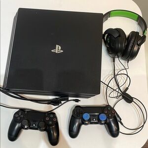 Sony Black PlayStation 4 Pro Console with DualShock 4 Controllers